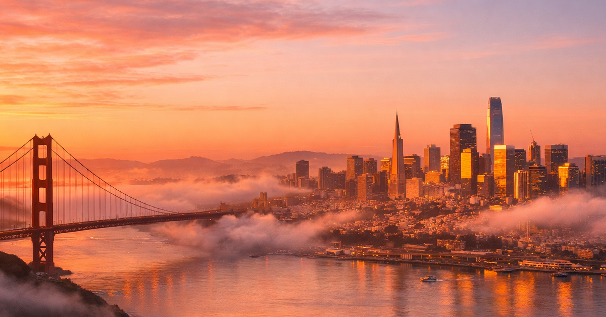 As the first light of dawn breaks over the San Francisco skyline the city emerges from the shadows bathed in soft hues of pink and gold The iconic Gol-1-1